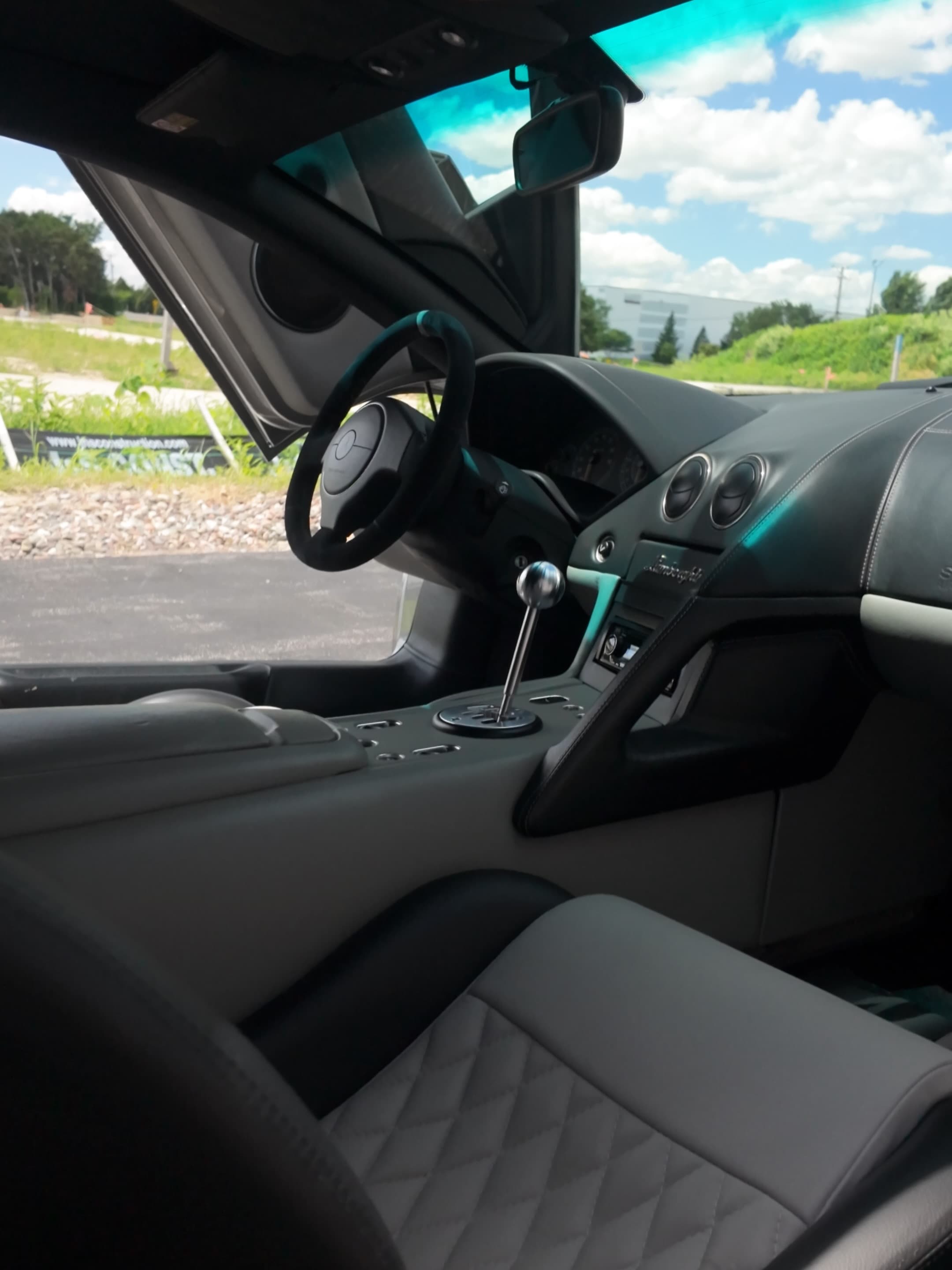 Lamborghini cabin with quilted leather after interior detailing